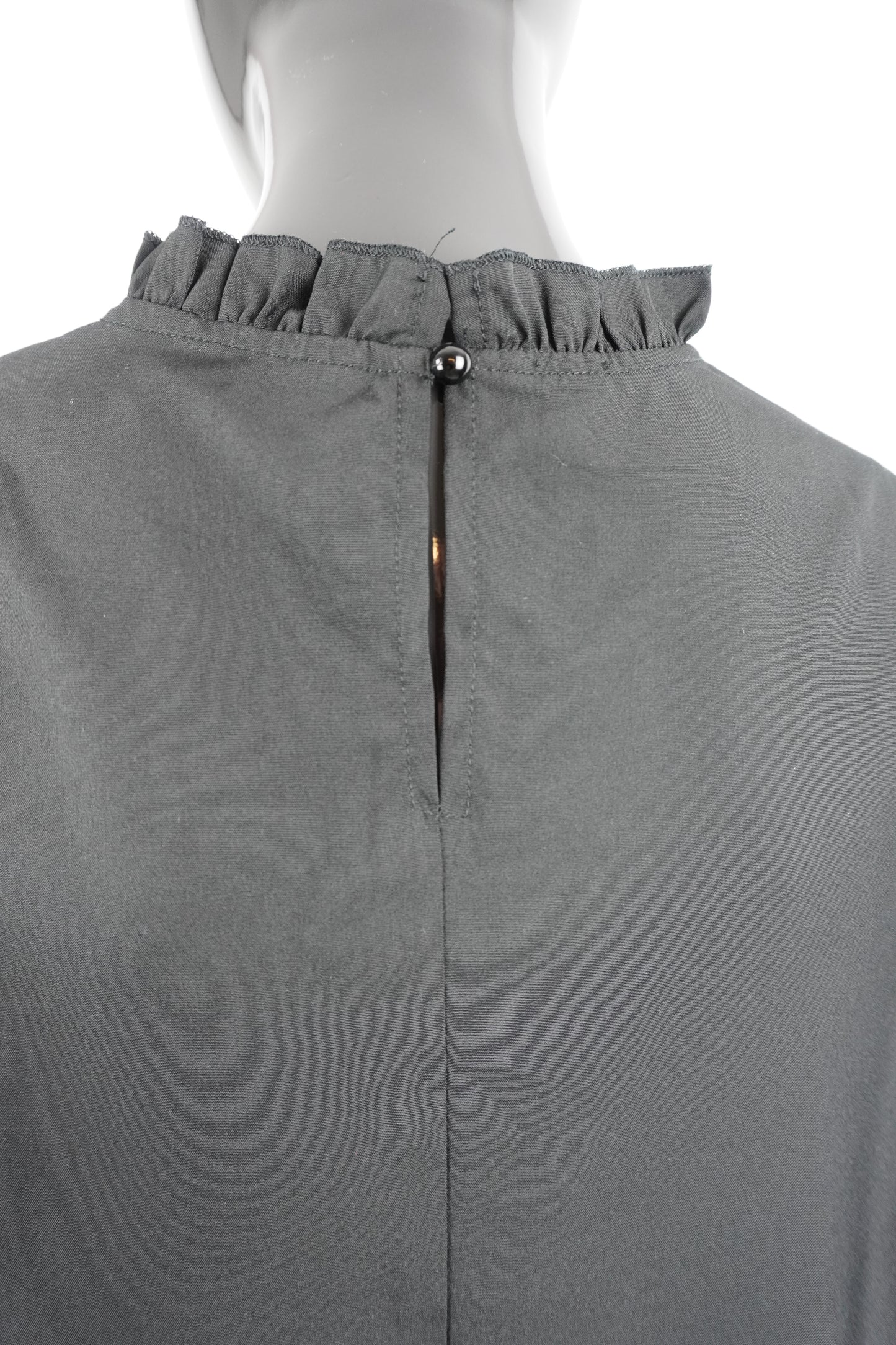 schwarze Bluse mit Ärmelspitze